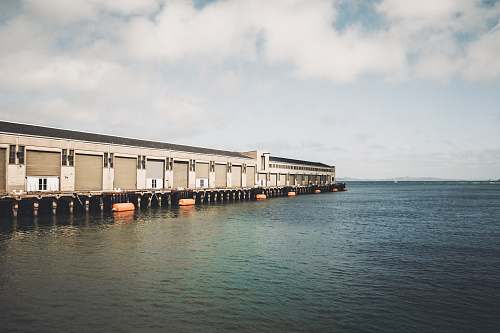san francisco gray building near body of water pier 39
